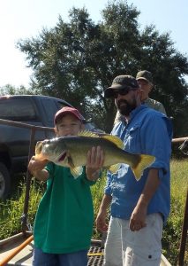 Once they are larger than 6 pounds, hold them like young Reed Graff is doing here.